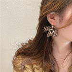 Cheeta Bow With Pearl Hangings Earrings Set